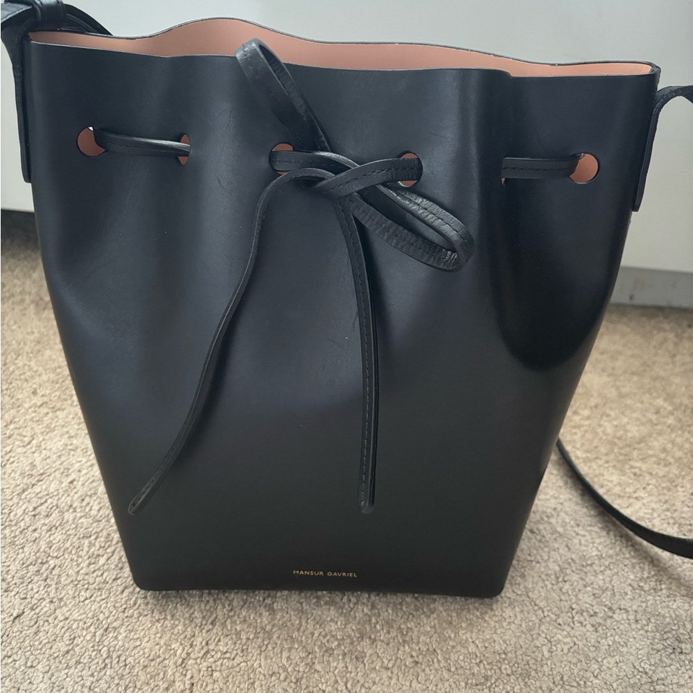 Mansur Gavriel black leather bucket bag, pink inside
